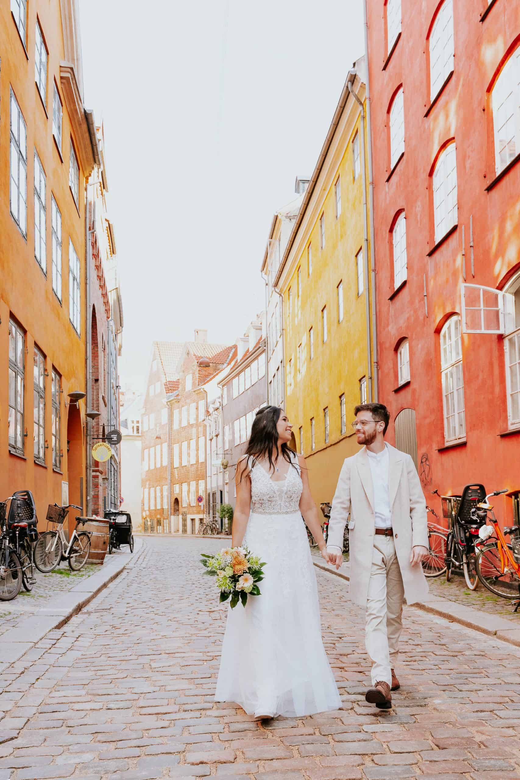 married-couple-walking-copenhagen-magstræde
